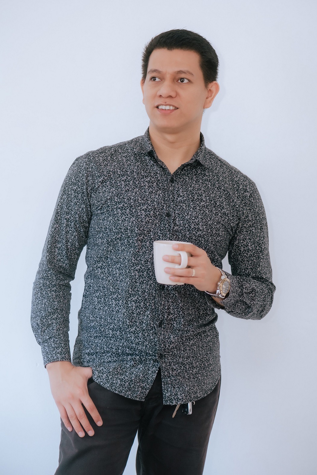 Regie Taking Coffee while Boosting his Creativity